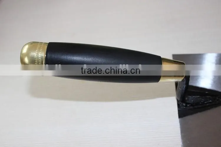 Bricklaying trowel with carbon steel blade