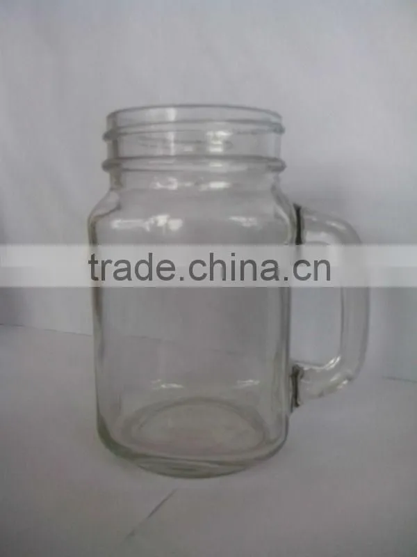 clear glass drinking cup with handle