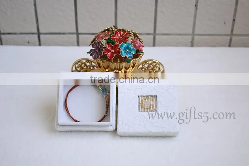 Elegant white wedding jewelry gift boxes with beaded name plate of G