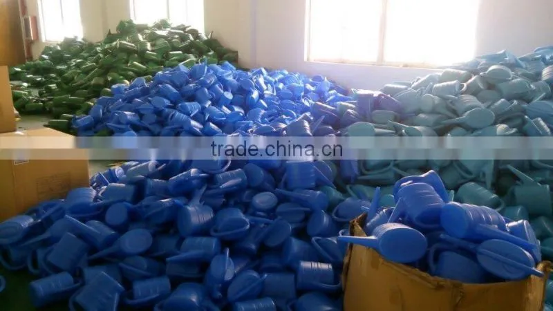 Blue plastic sprinkled kettle