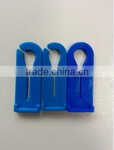 Disposable medical plastic tube slide clamp