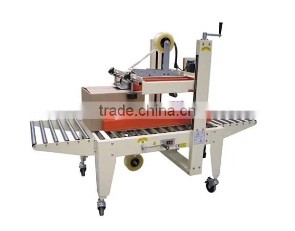 Semi-auto boxes sealing strapping machine