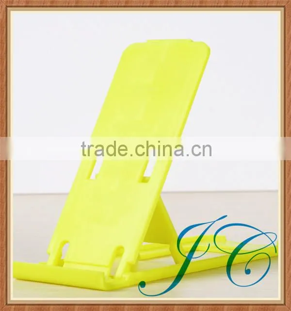 Simple but fashionable plastic cell car vent phone ring holder for desk