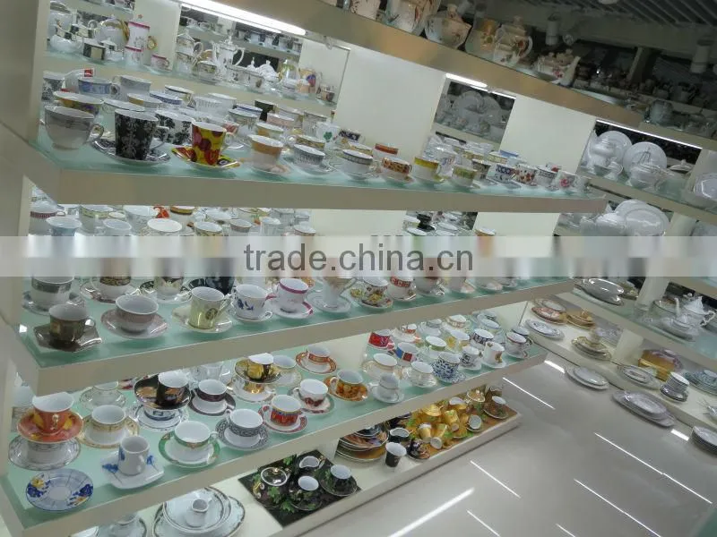 plated porcelain tea cup and saucer