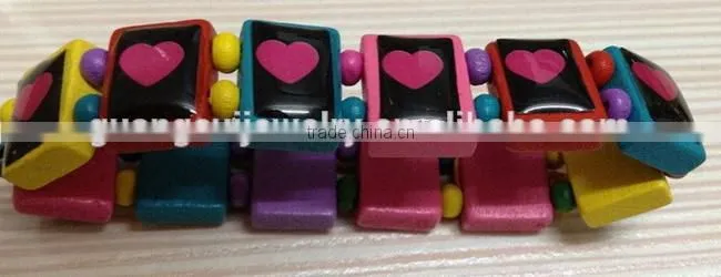Wood bracelet with epoxy logo sticker