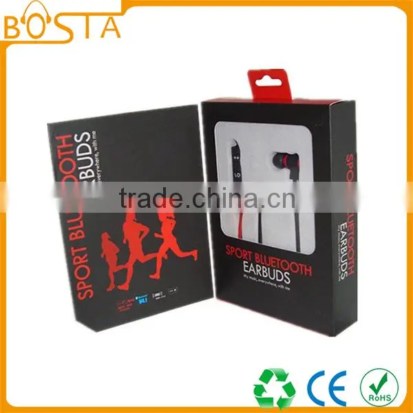 Sports sweat-proof wholesale shiny orange soft ruberized string bluetooth earphones