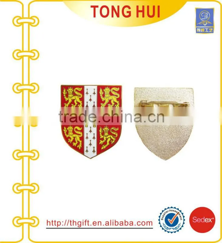 Metal badges with fan-shaped design