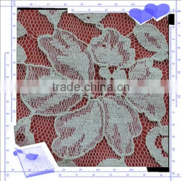 White crochet pattern lace for table cover