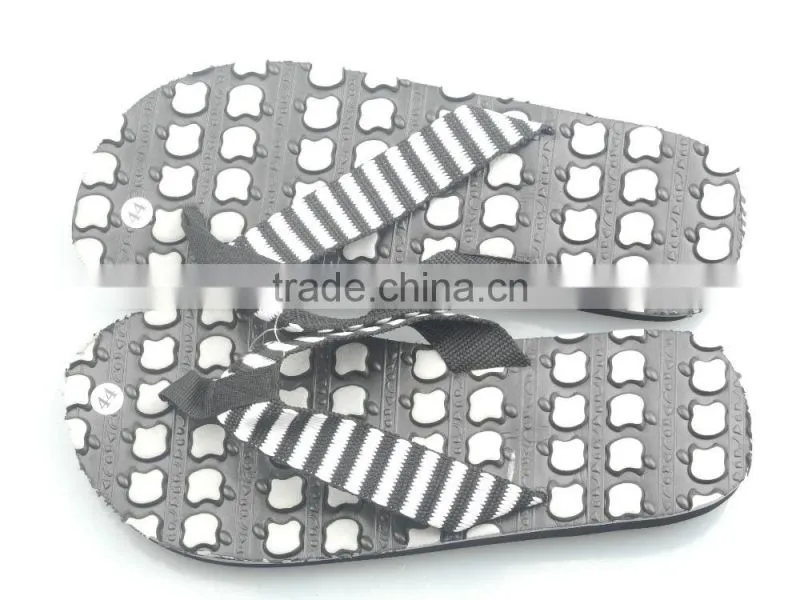 Men's black and white flip flops stock shoe