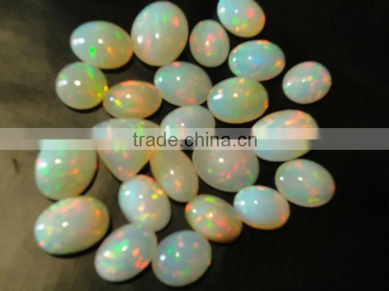 Natural Ethiopian Fire Opal oval cabochon cut beads