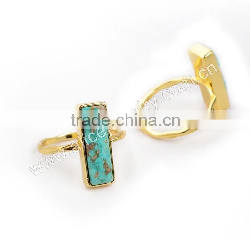 Natural blue turquoise set into a 18k gold bezel
