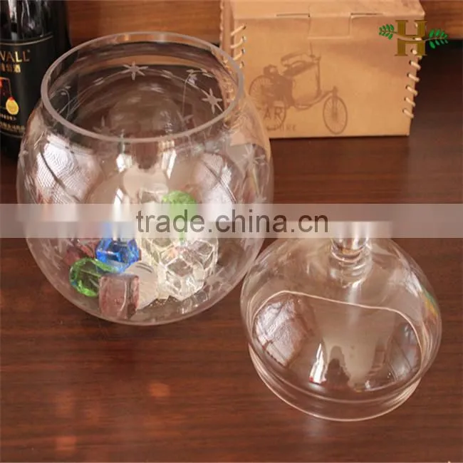 Handmade footed large glass jar with food arrangement