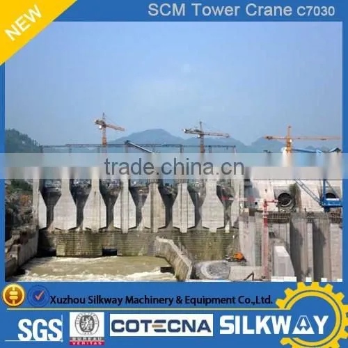 Building Construction site generally using Model SCM-C7030 tower cranes
