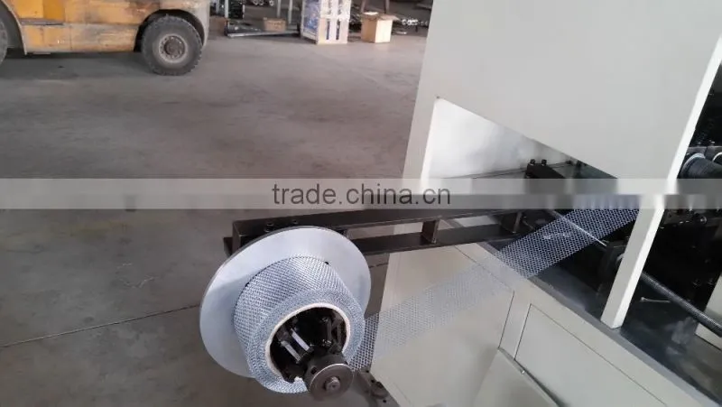 Automatic expanded metal spiral tube making machine