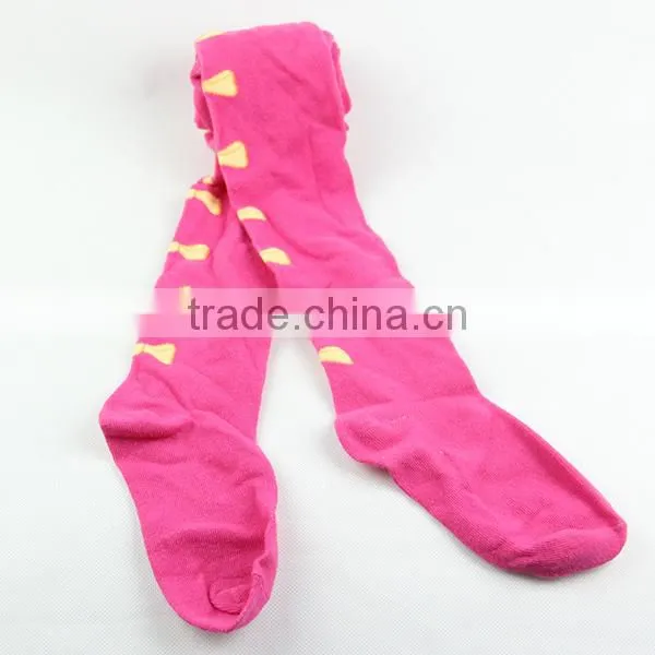 Girl dancing tights pantyhose in pink colored with nice bowknot