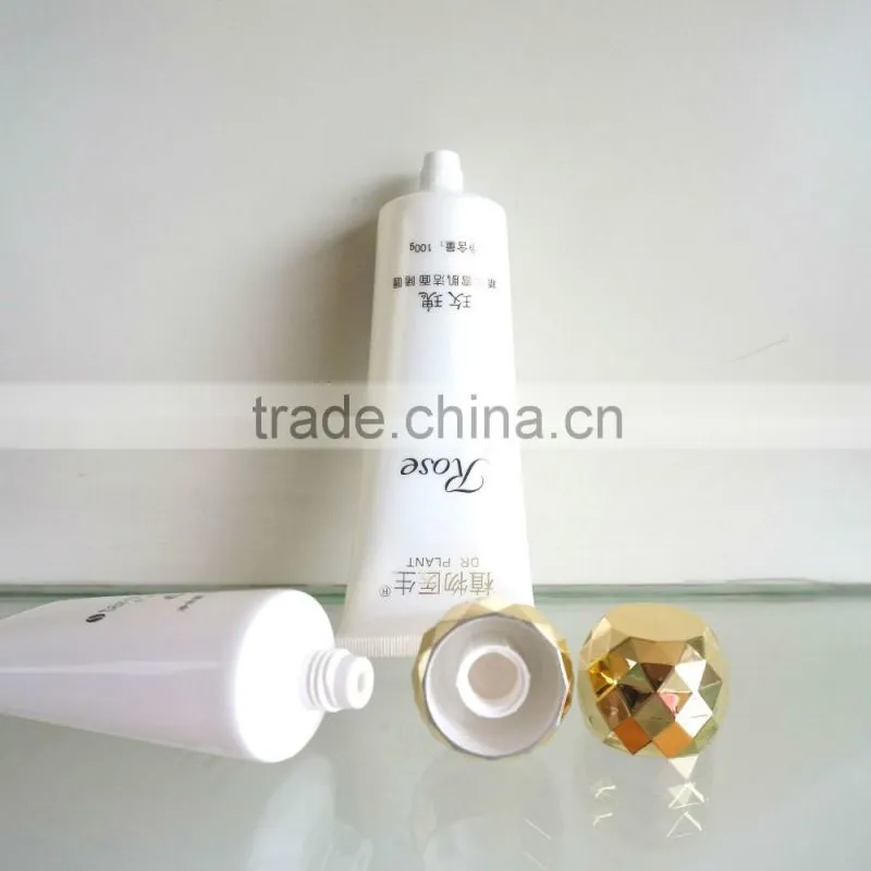 plastic oval tube with plating gold screw on cap for face washing Dia 40mm