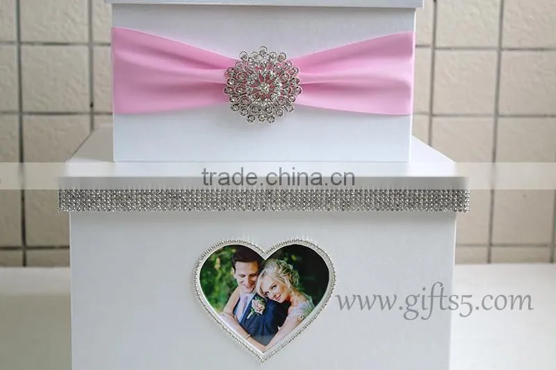 The money box with heart shape photo frame in handmade
