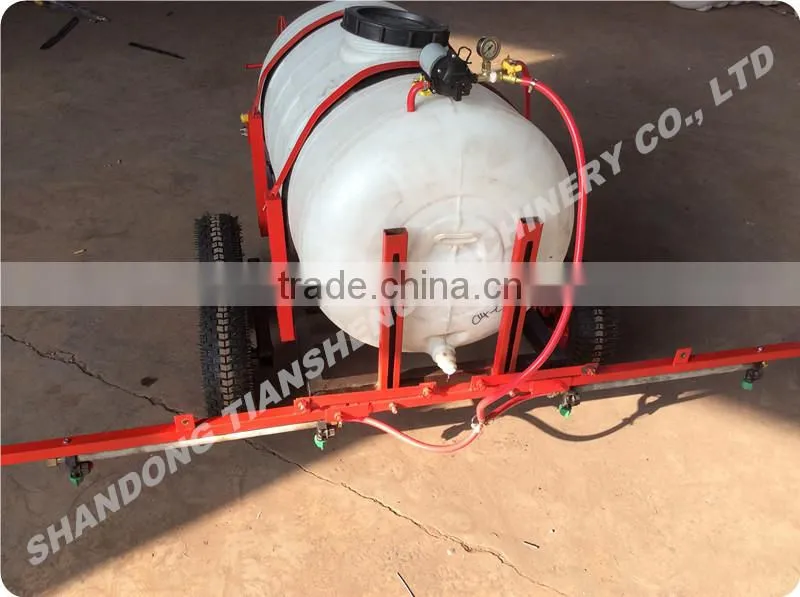 Tractor implement boom sprayer