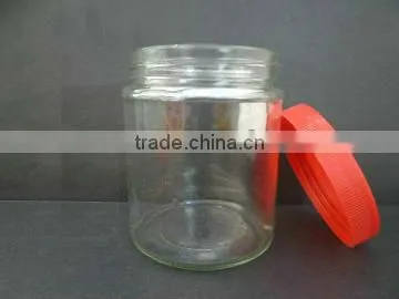 clear storage jar for honey, empty glass bottle