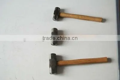 Sledge hammer with wooden handle