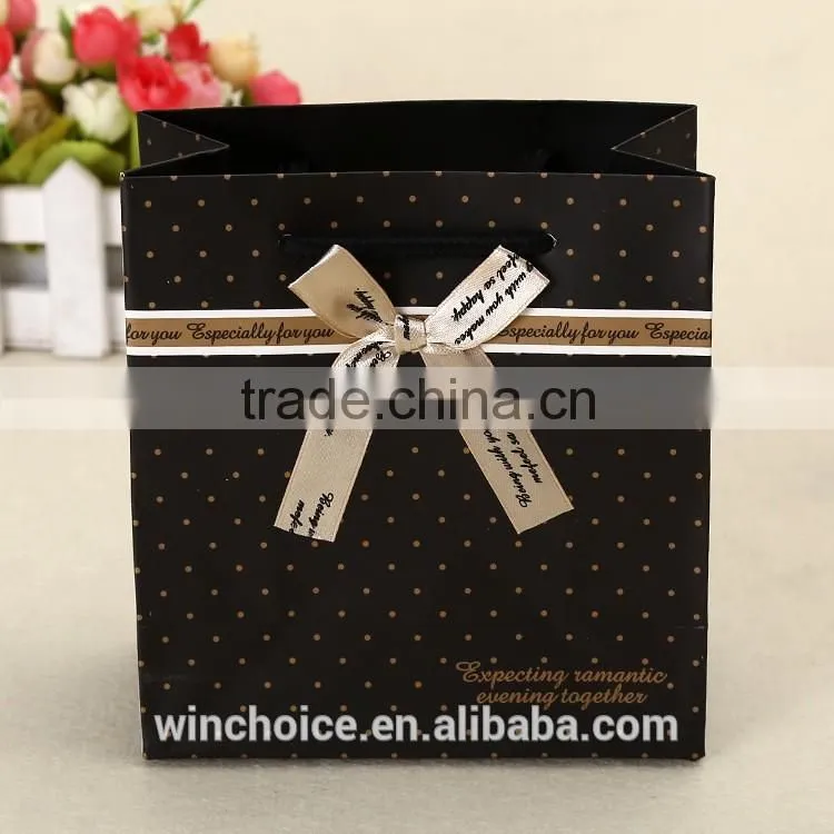 Ivory board /art paper bag ,shopping bags,promotion bag ,cotton rope handle , customized printing is welcome,with bow-knot Decor
