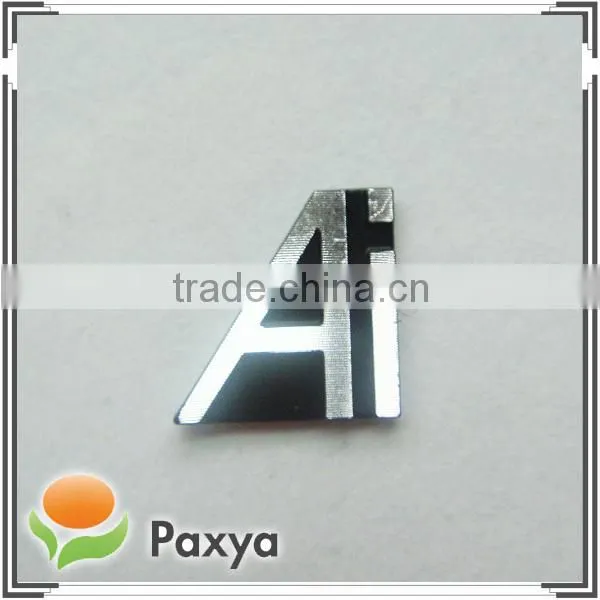 Metal logo ; Embossed metal label