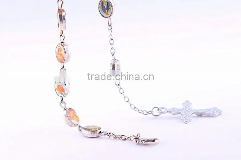 Rosary beads with saint medals