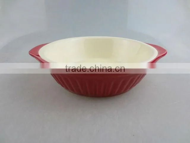 red-glazed ceramic oval tableware