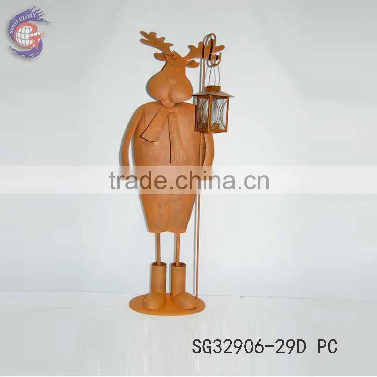 Outdoor decorations of rusty metal elk holding lantern for decorate christmas ornaments