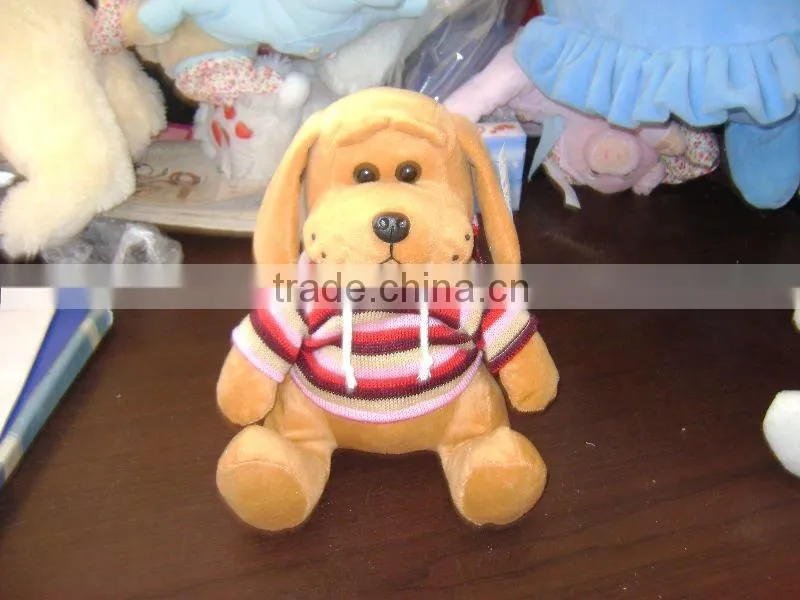 plush dog with knitted garment