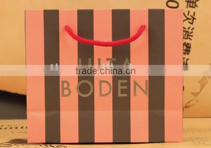 Good quality shopping paper gift bag with stripe and handles for clothes packaging