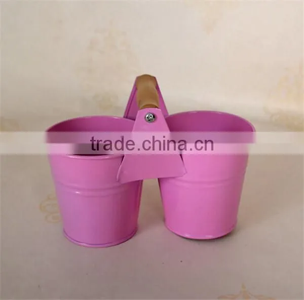 Small colored metal split pot planter