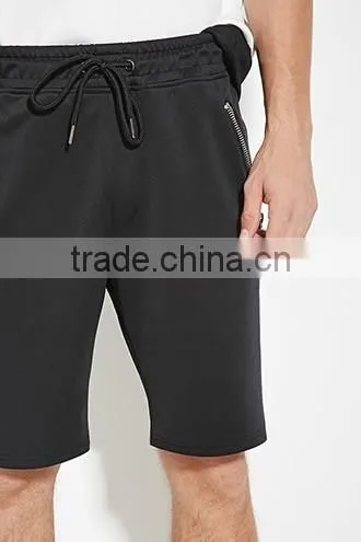 Man four minutes of pants draw string waist shorts