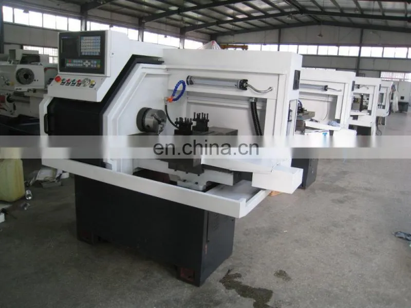 The small cnc lathe machine with chuck and tool turret CK0640A