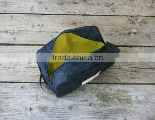 Custom khaki waxed canvas dopp kit with leather trim