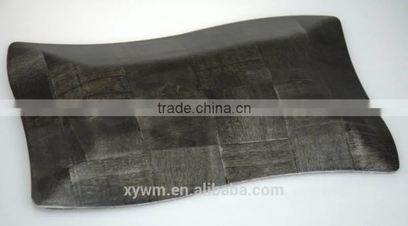 Black woven wooden serving tray and plate