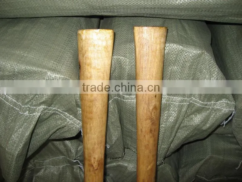 Garden used steel pickaxe with wooden handle