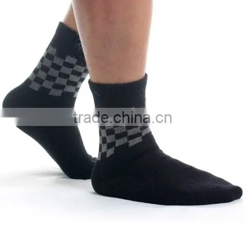 Man's classic stylish black color wool tube socks with pattern