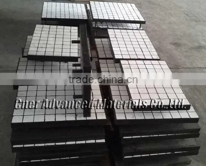 Steel and rubber backed ceramic liner