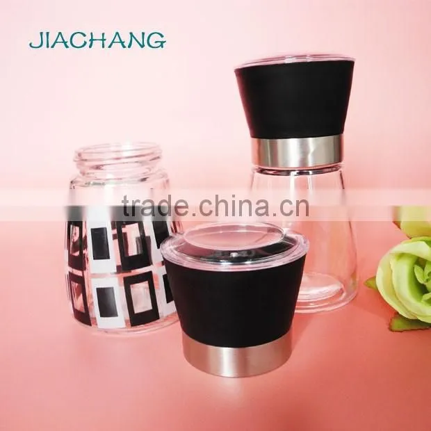 glass salt spice condiment jar with black grinder cap