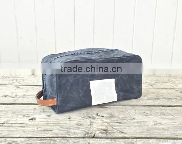 Custom khaki waxed canvas dopp kit with leather trim