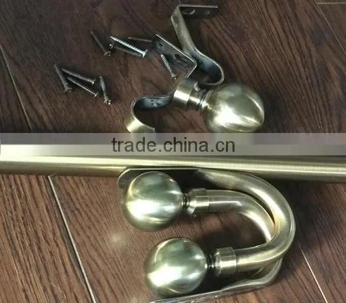 Brass/Gold Curtain Pole And Tie backs