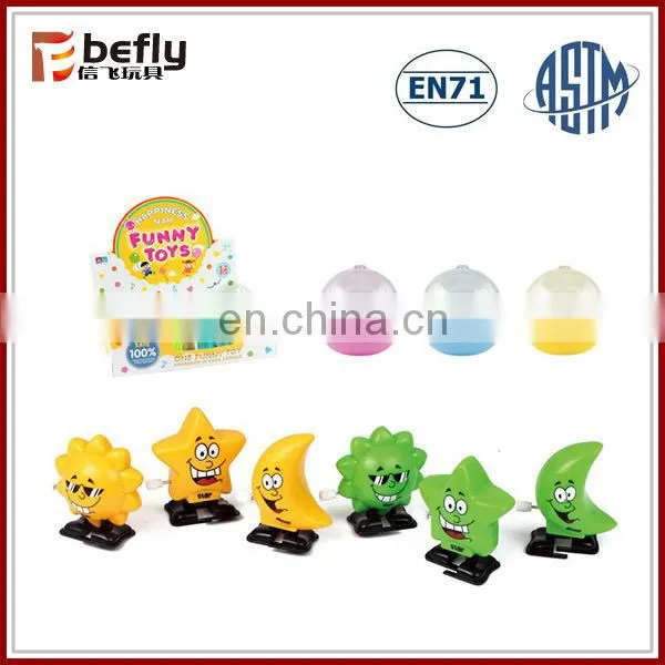 Novelty plastic star sun moon wind up toys cheap