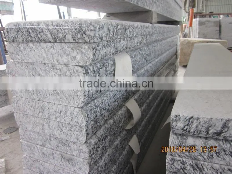China spray white granite tile prices
