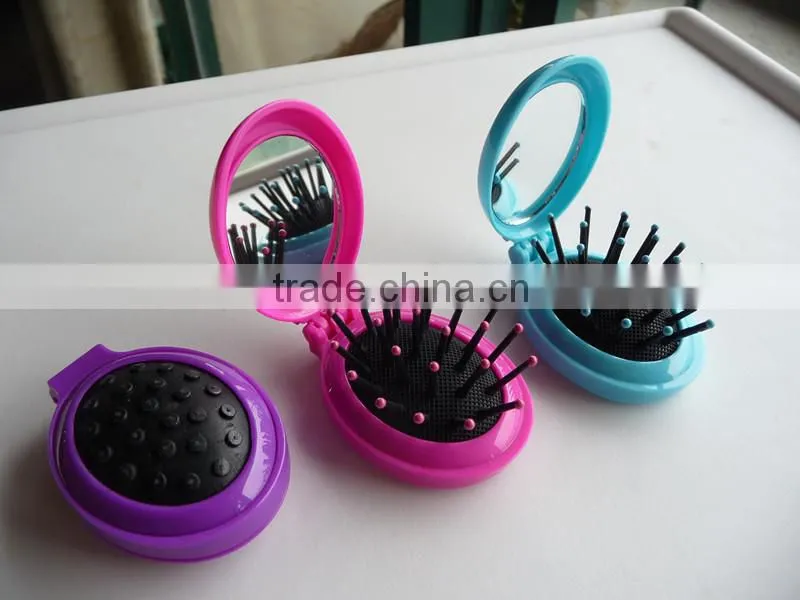Plastic foldable oval shape makeup folding comb with mirror