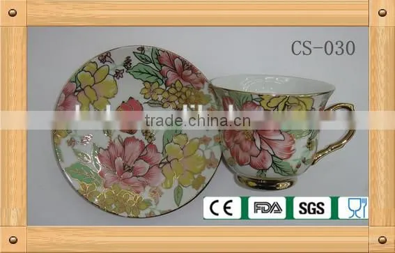 flower tea cup and saucer with gold rim