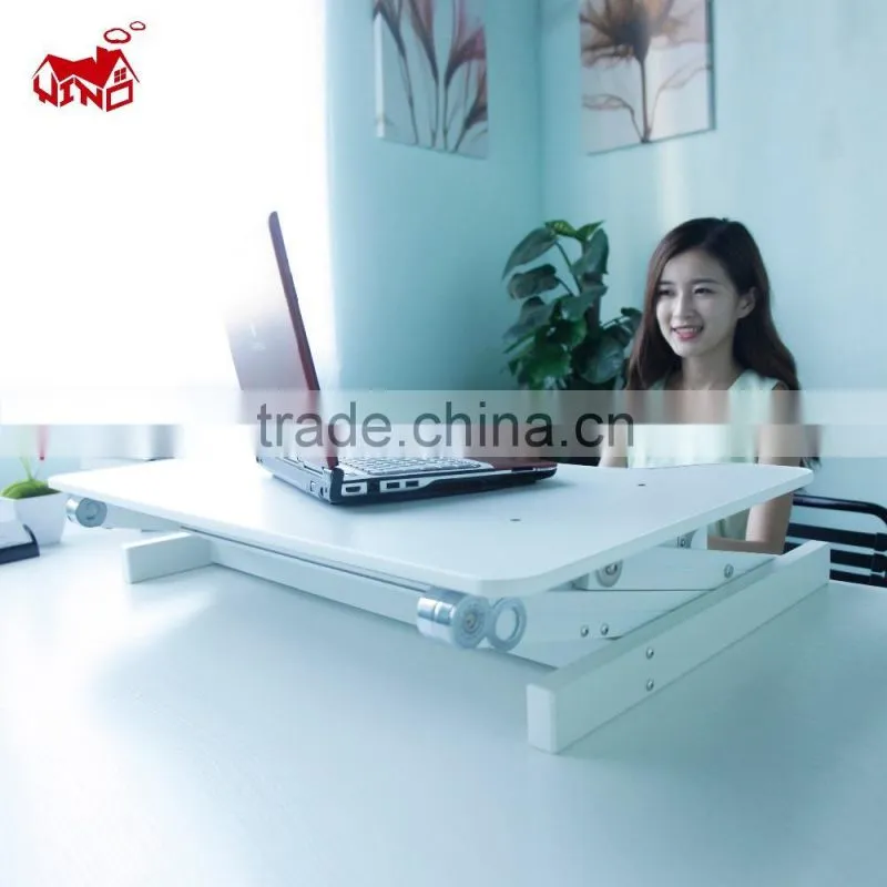 Ergonomic design portable and adjustable standing laptop stand