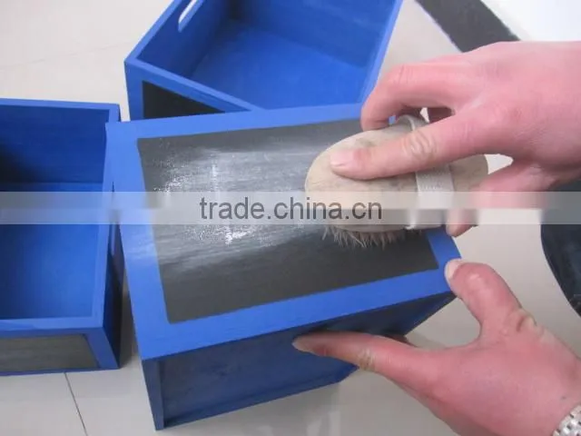 colorful wooden boxes with black board