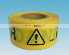 yellow and black police caution tape barrier tape
