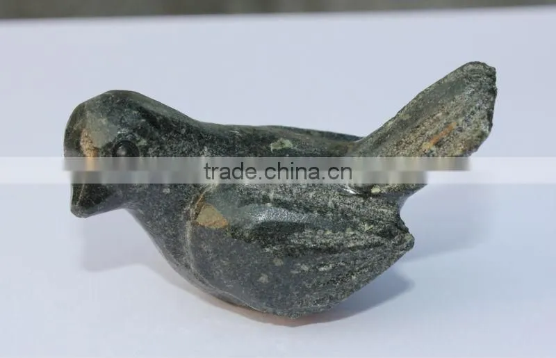 hand carved stone bird sculpture